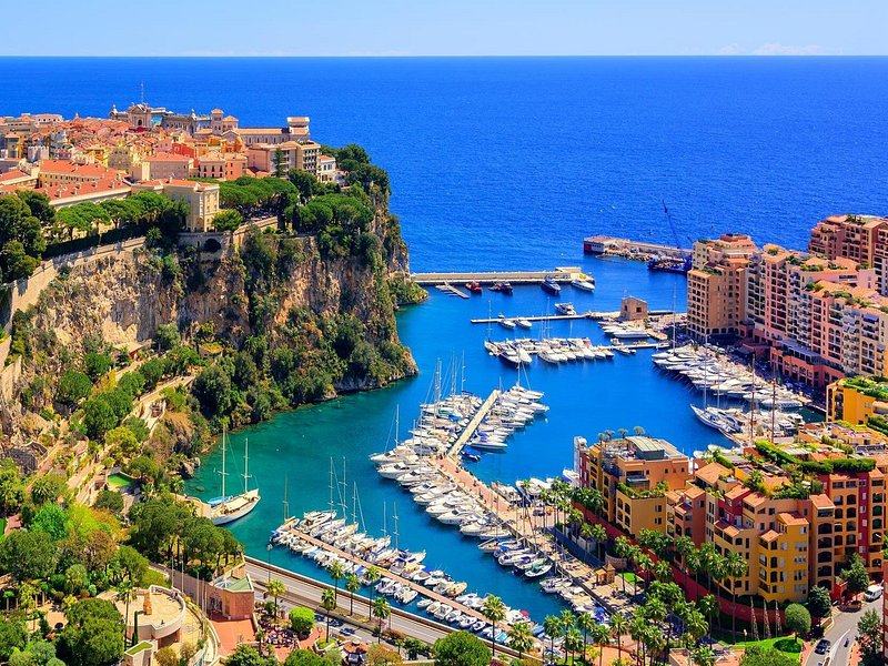 The Rock of Monaco and the yacht harbour below it, from the heights